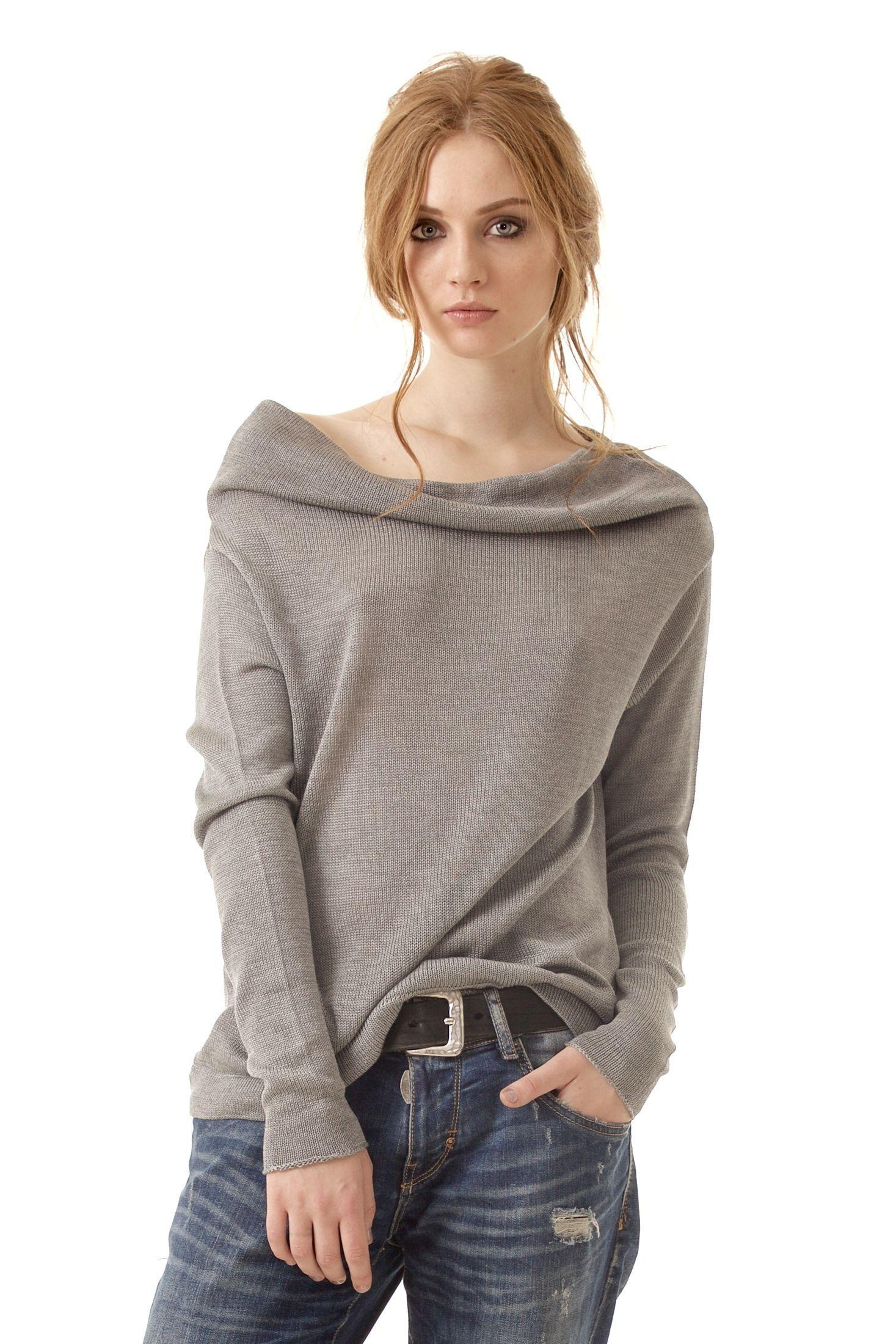 Shop AGNES, Krista Elsta's off-the-shoulder grey sweater, a bestseller crafted from 100% Italian cashmere. Its cowl collar and relaxed fit create an effortlessly chic style suitable for any occasion.