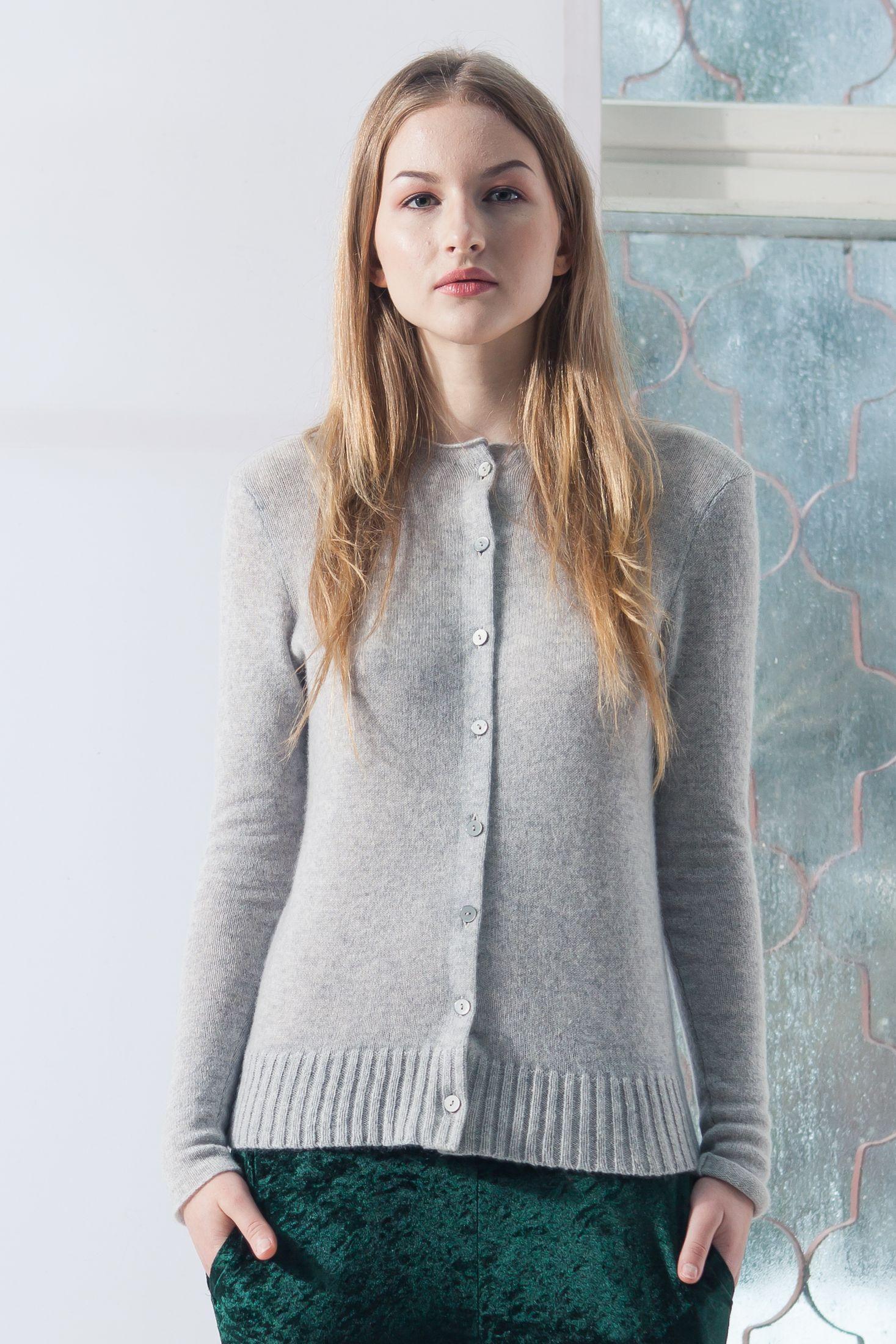 Shop HELEN, the grey cashmere button-down cardigan by Krista Elsta, a versatile piece that combines comfort and sophistication effortlessly.