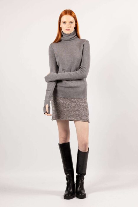 Compliant image of a cozy women's turtleneck sweater ADA in elegant grey