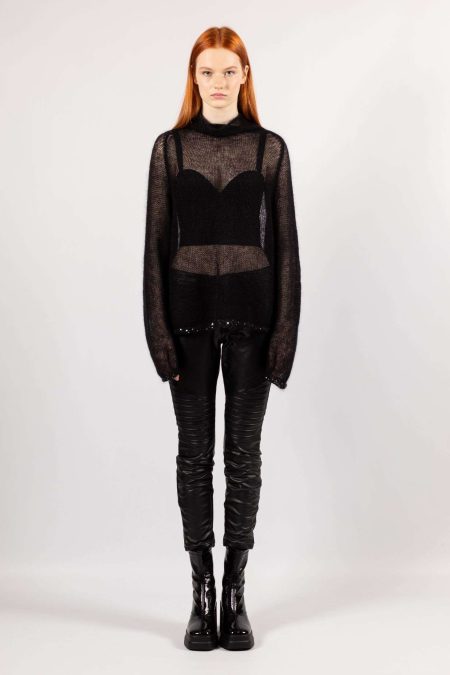 Elevate your winter fashion game with our women's black mohair sweater, a versatile piece with long sleeves and a subtle transparent detail for added flair.