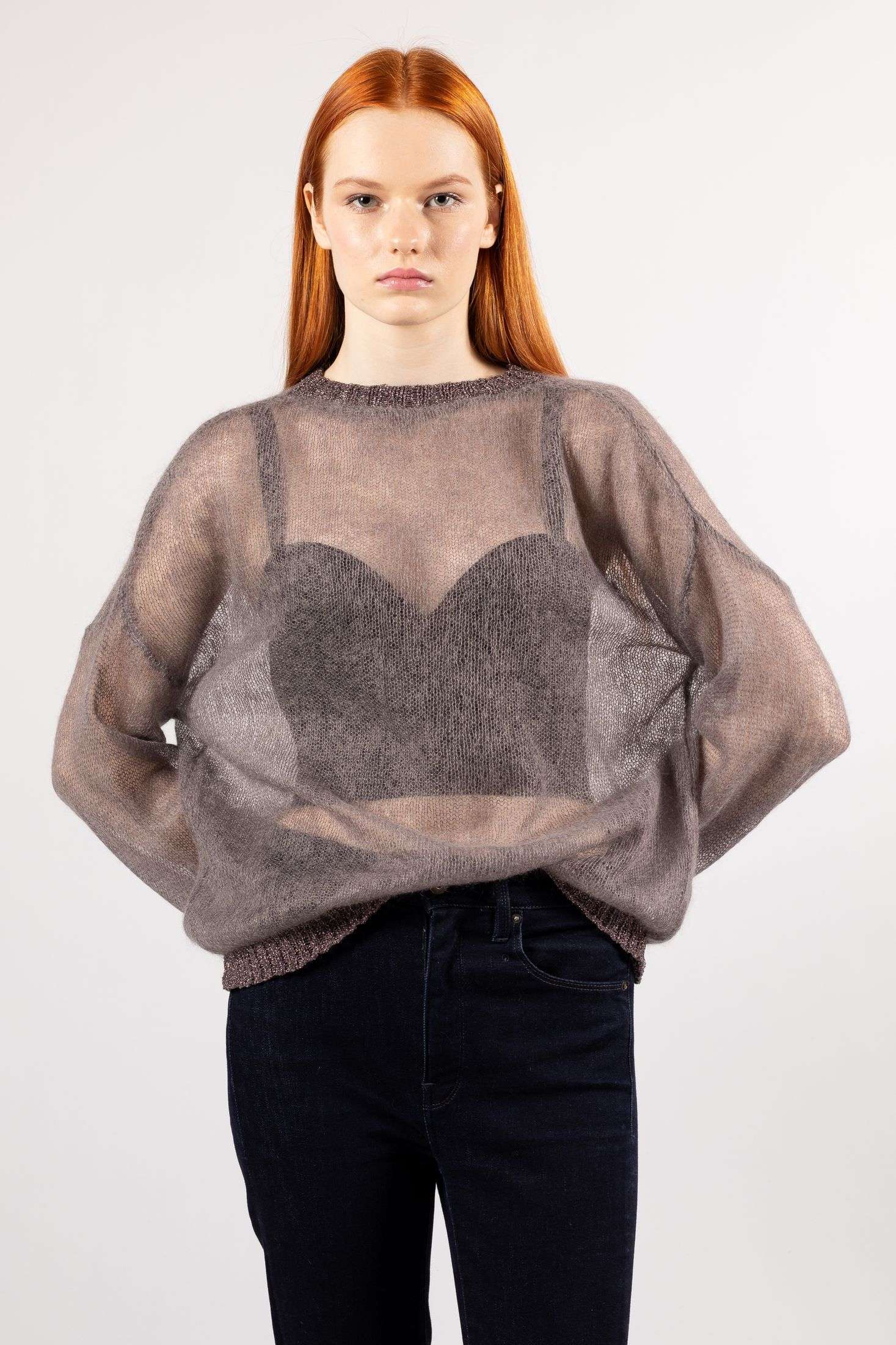 Luna: Embrace warmth and elegance in a brown mohair sweater with transparent knit.