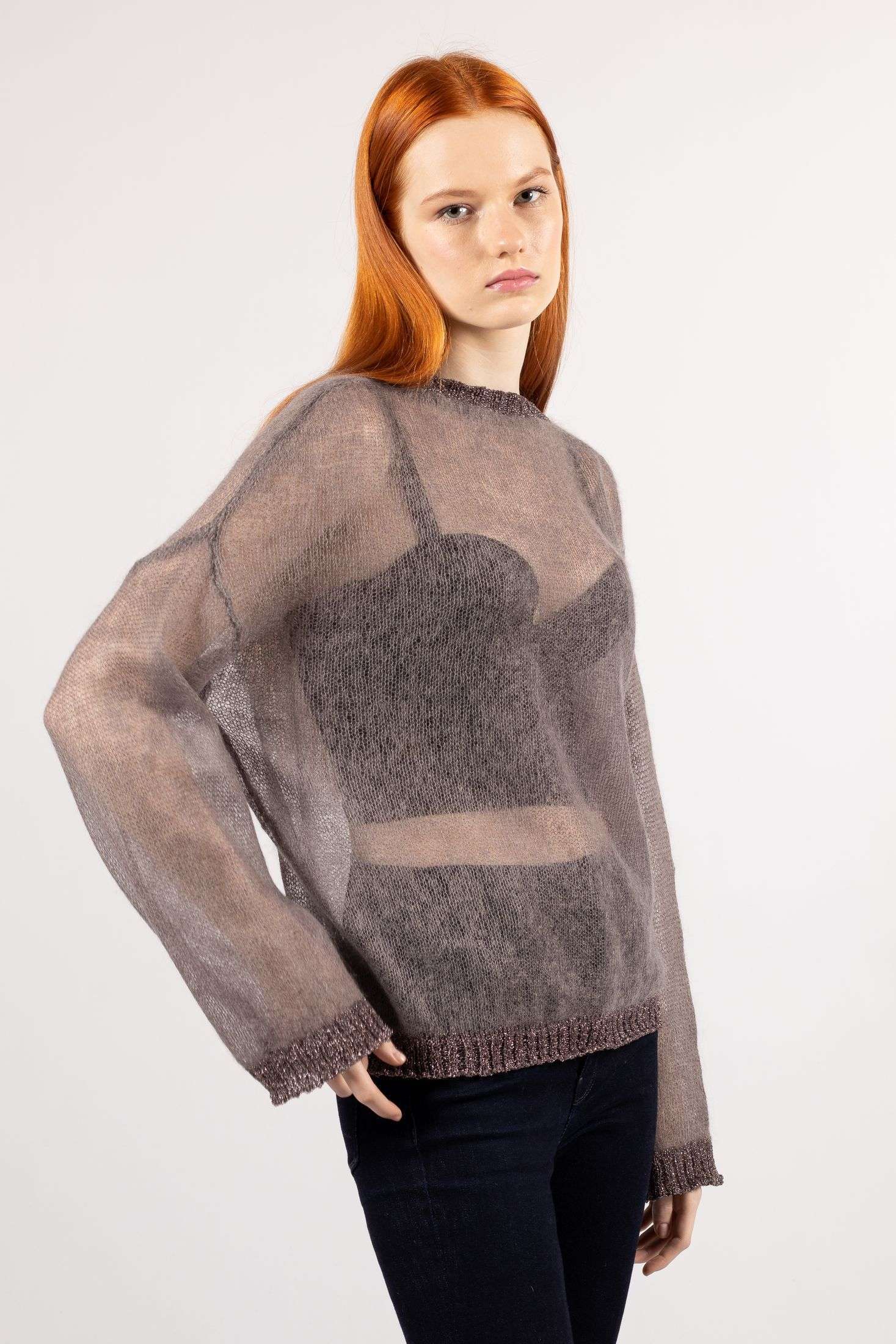 Luna: Unveil winter charm with a brown mohair sweater and delicate transparent knit.