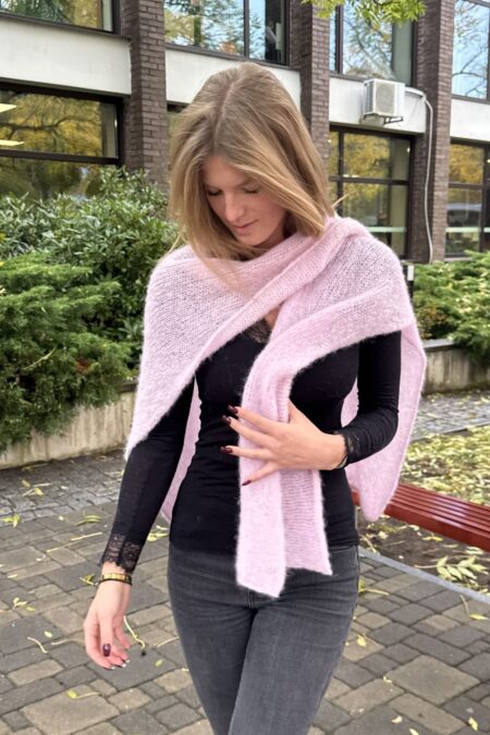 Woman wearing dusty rose scarf with sleeves, front view showing elegant drape